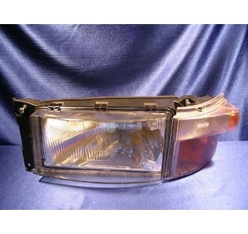 Světlomet SCANIA 124 levý se směrovkou SERTPLAS 505609/L